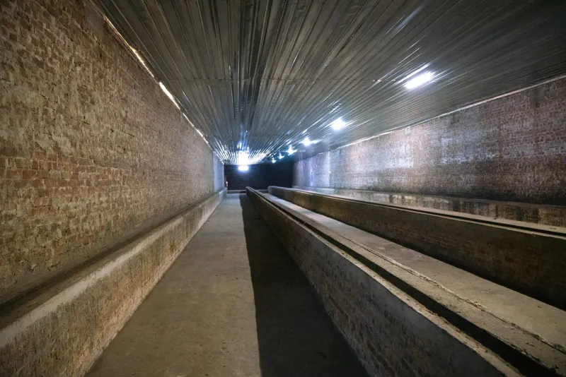 Empty ROC tobacco curing tunnel ready for trolley loading